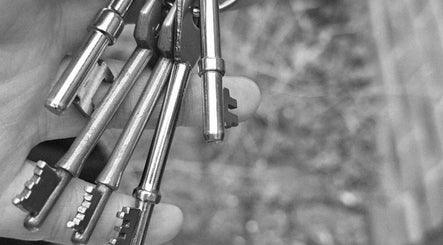 Vintage keys held in hand at Pearl Collective, Newbury, England, GB, capturing charm and elegance.