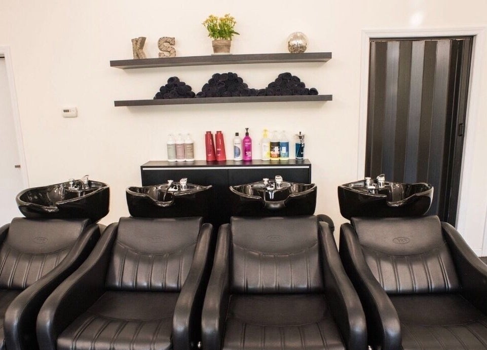 Luxurious wash stations at K&S Salon in Albany, New York, US offering premium hair care solutions.