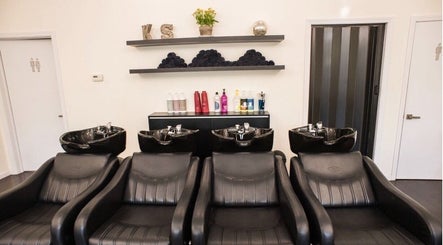 Luxurious wash stations at K&S Salon in Albany, New York, US offering premium hair care solutions.