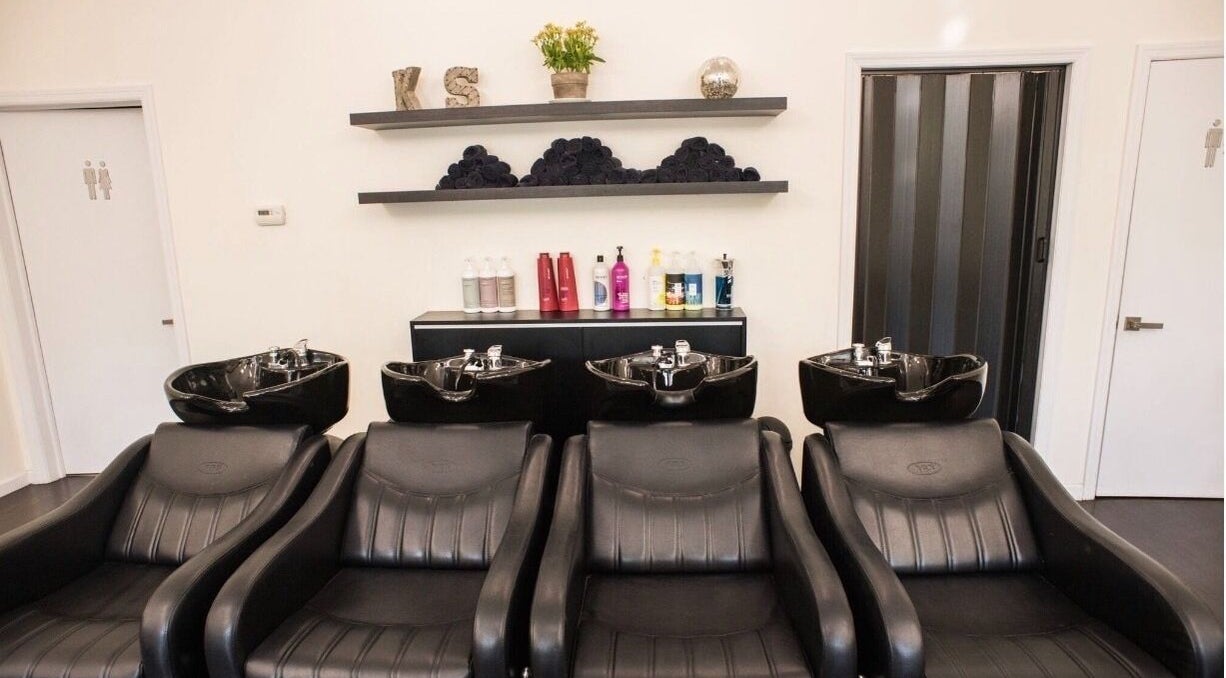 Luxurious wash stations at K&S Salon in Albany, New York, US offering premium hair care solutions.