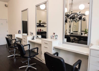 K&S Salon's elegant styling stations in Albany, New York, US showcase clean, modern design.