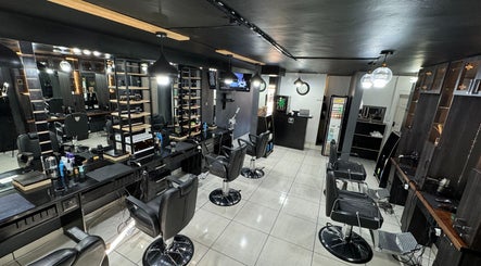 Sleek interior of Hairsurgery Lifestyle in Bloemfontein, Free State, ZA, showcasing modern salon stations.