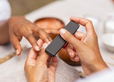 Manicure session at Siara Nails, Paramaribo, SR highlighting detailed nail filing.