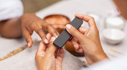 Manicure session at Siara Nails, Paramaribo, SR highlighting detailed nail filing.
