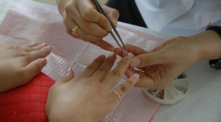 Nail art in progress at Siara Nails, Paramaribo, Paramaribo, SR, showcasing detailed manicure work.