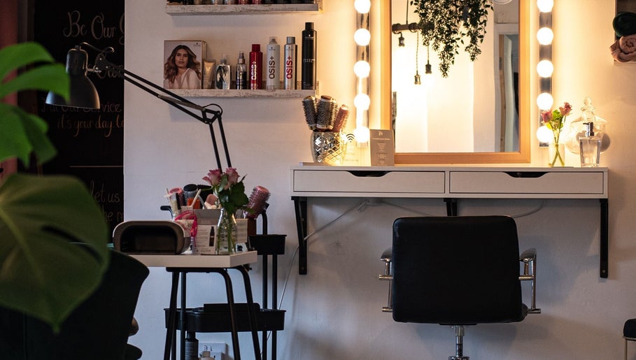 Elegant beauty station at Posh Nail and Beauty, Aston-on-trent, England, GB with glam lighting and styling tools.