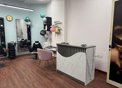 Chic interior of Royal Amber lady salon in Dubai, Dubai, AE with stylish decor and hair stations.