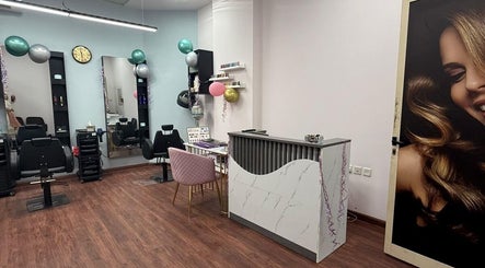 Chic interior of Royal Amber lady salon in Dubai, Dubai, AE with stylish decor and hair stations.