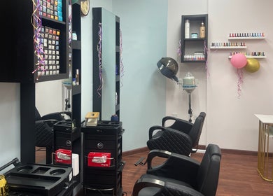Sophisticated styling stations at Royal Amber lady salon, Dubai, Dubai, AE, featuring chairs and decor.