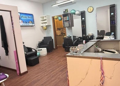 Interior of Royal Amber lady salon, Dubai, Dubai, AE, featuring stylish chairs and decor.