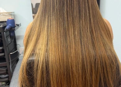Long, straightened hair at Royal Amber lady salon in Dubai, Dubai, AE, showcasing professional hair care.