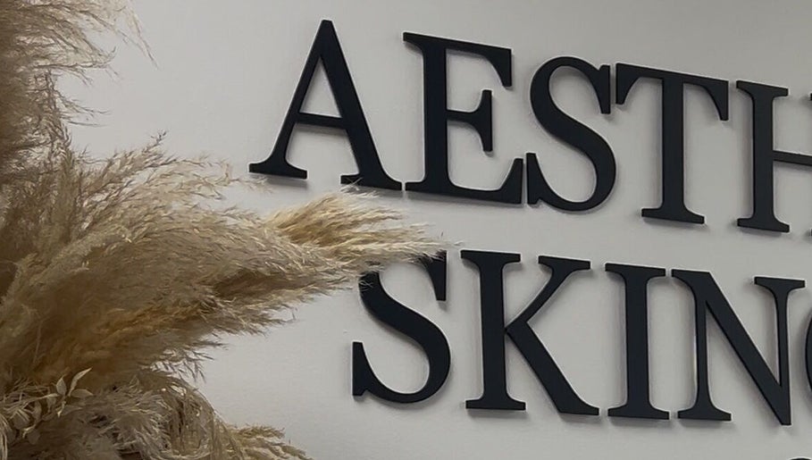 Aesthetic SKIN signage decor at By Lottie Grace, Margate, England, GB with pampas grass.