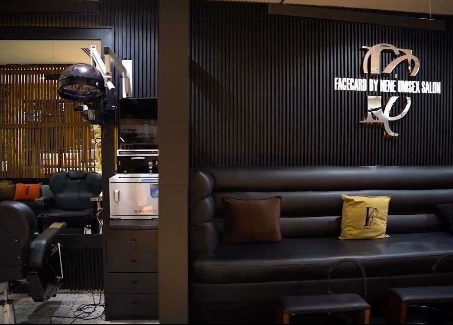 Modern salon interior with sleek black seating at Mufasxclusivetouch, Abuja, Federal Capital Territory, NG.