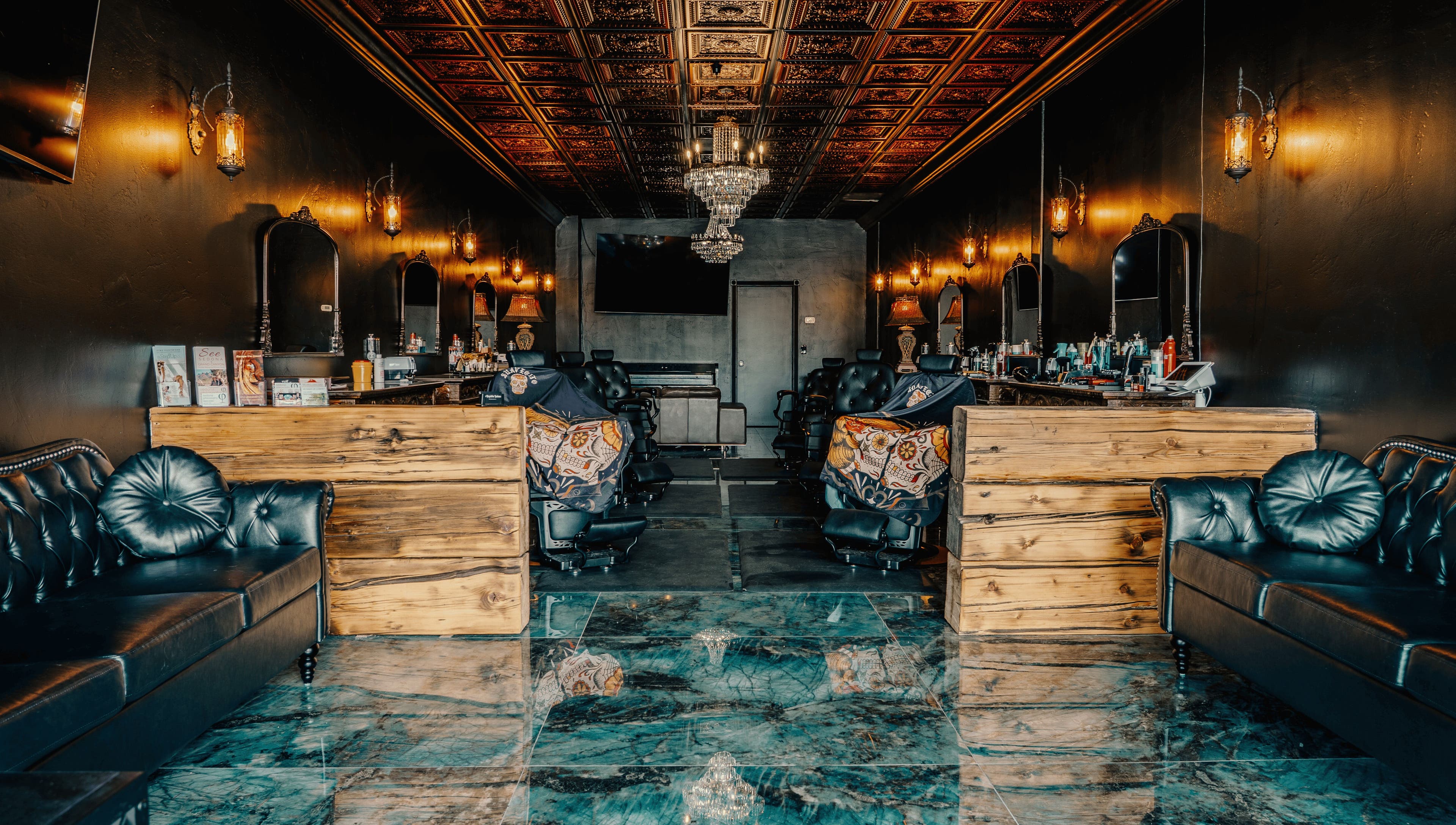 Elegant interior of Cut Republic Sedona in Sedona, Arizona, US, featuring vintage decor and plush seating.