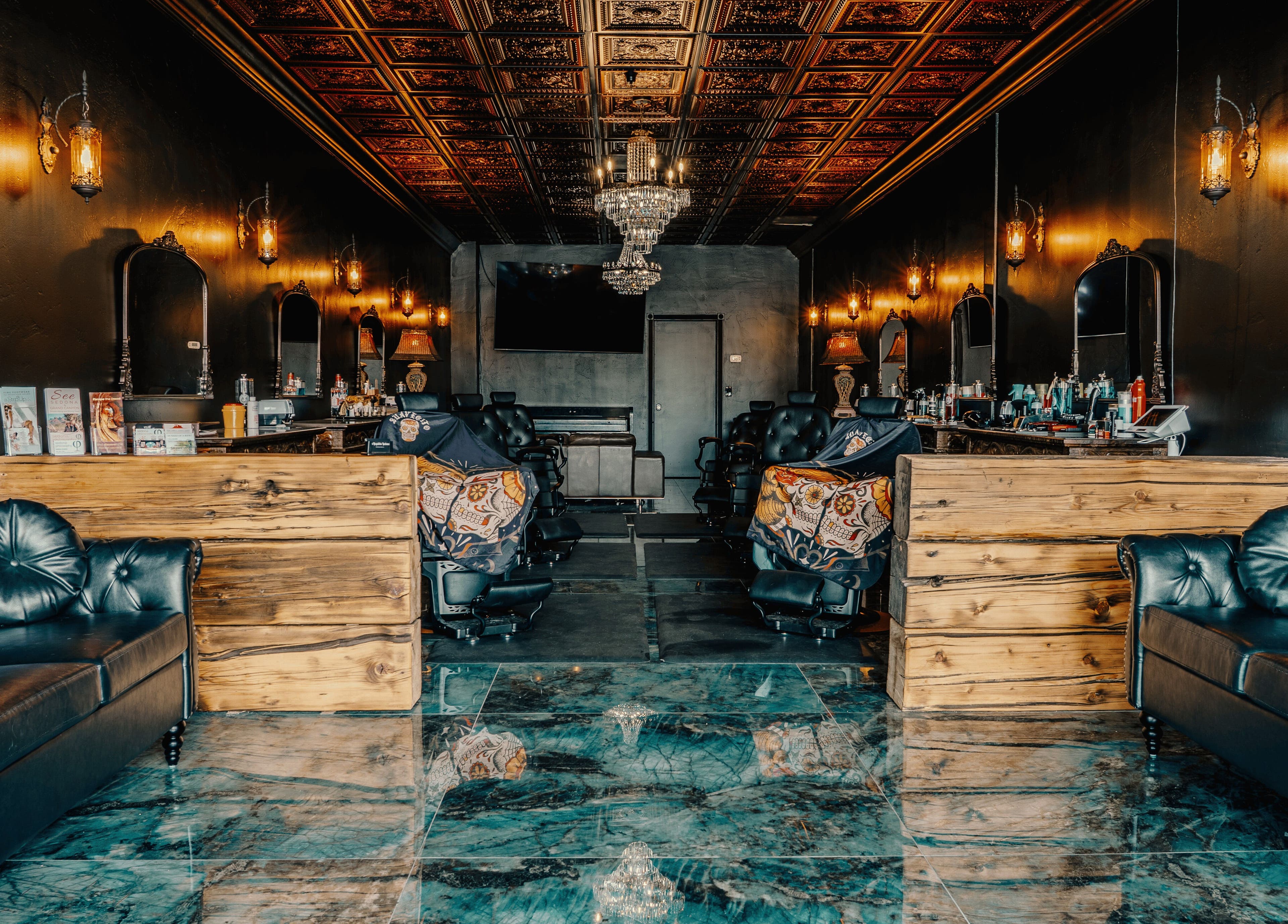 Elegant interior of Cut Republic Sedona in Sedona, Arizona, US, featuring vintage decor and plush seating.