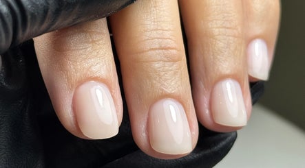 Manicured nails with a glossy finish at Karas Beauty Hub in Montreal, Canada, CA.
