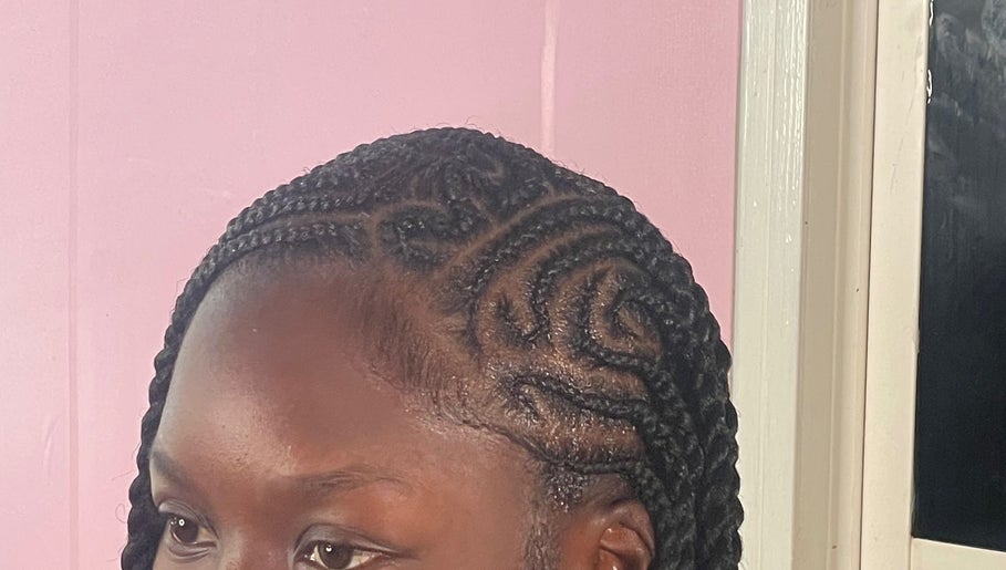 Intricate braided hairstyle at Tees Hair Affair, Saint John's, Saint John, AG showcasing stylish craftsmanship.