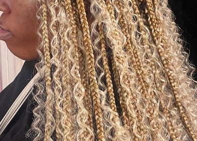 Beautiful blonde braided hairstyle at Tees Hair Affair, Saint John's, Saint John, AG.