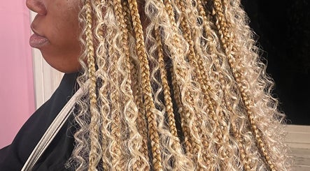Beautiful blonde braided hairstyle at Tees Hair Affair, Saint John's, Saint John, AG.