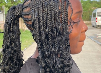 Intricate braided hairstyle at Tees Hair Affair, Saint John's, Saint John, AG.