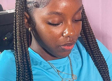 Stylish braids by Tees Hair Affair in Saint John's, Saint John, AG, showcasing intricate hair design.