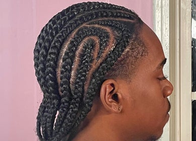Intricate cornrows at Tees Hair Affair in Saint John's, Saint John, AG. Modern hairstyling with precision.
