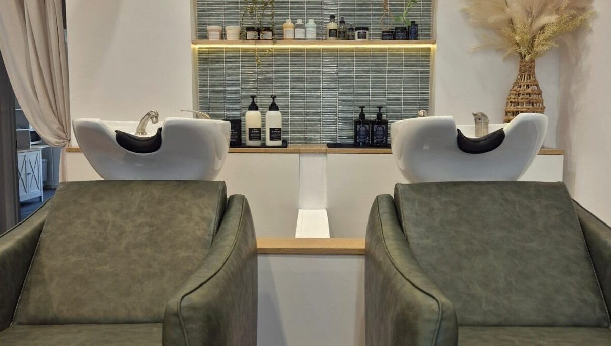 Elegant wash stations at The Studio by Laurine Durand in Camp Hill, Queensland, AU with modern decor.