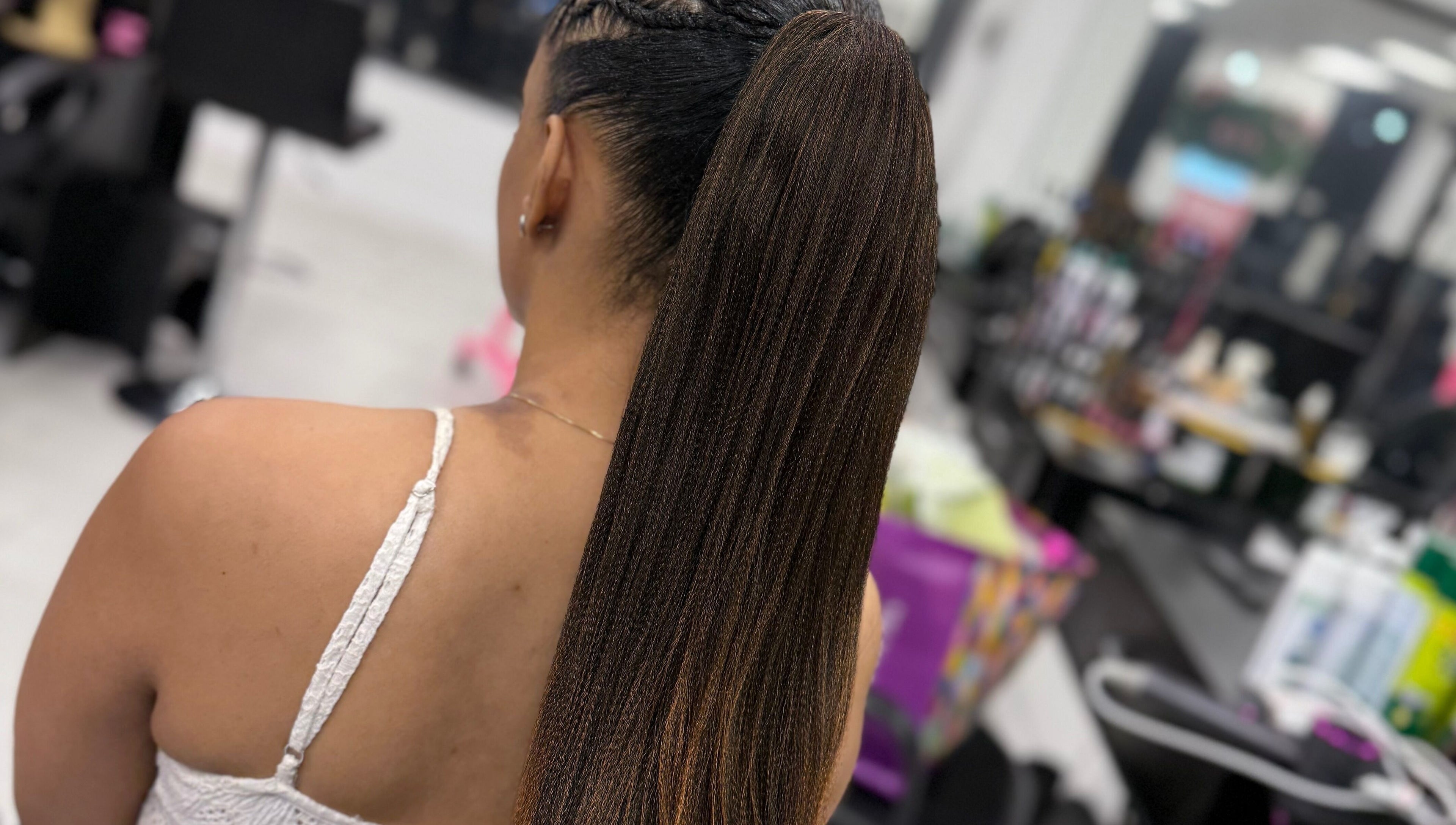 Elegant braided hairstyle at Funmi’s in New York, New York, US, showcasing intricate detailing.