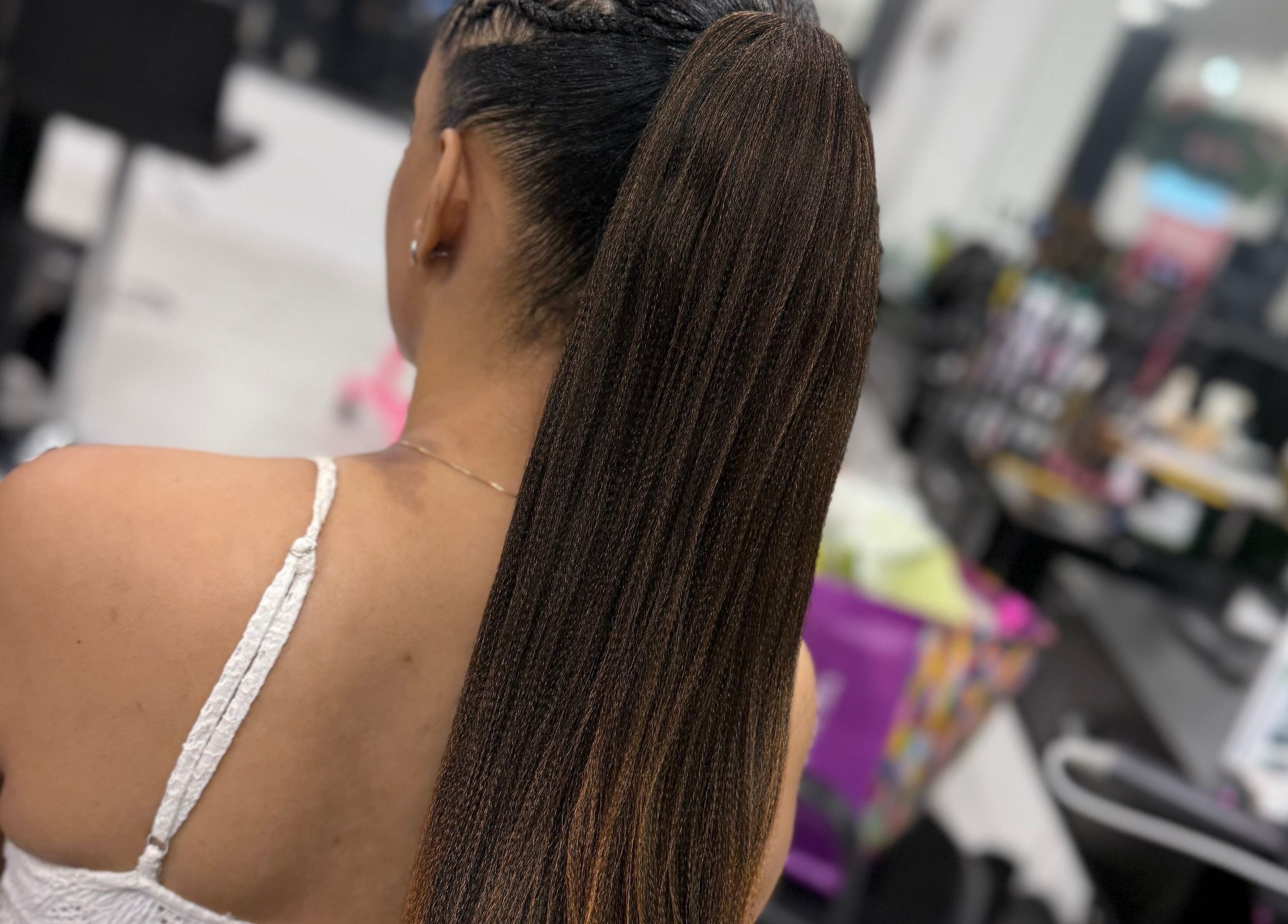 Elegant braided hairstyle at Funmi’s in New York, New York, US, showcasing intricate detailing.