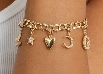 Elegant charm bracelet from LINKED (Mobile Home Appointments UAE), Dubai, AE.