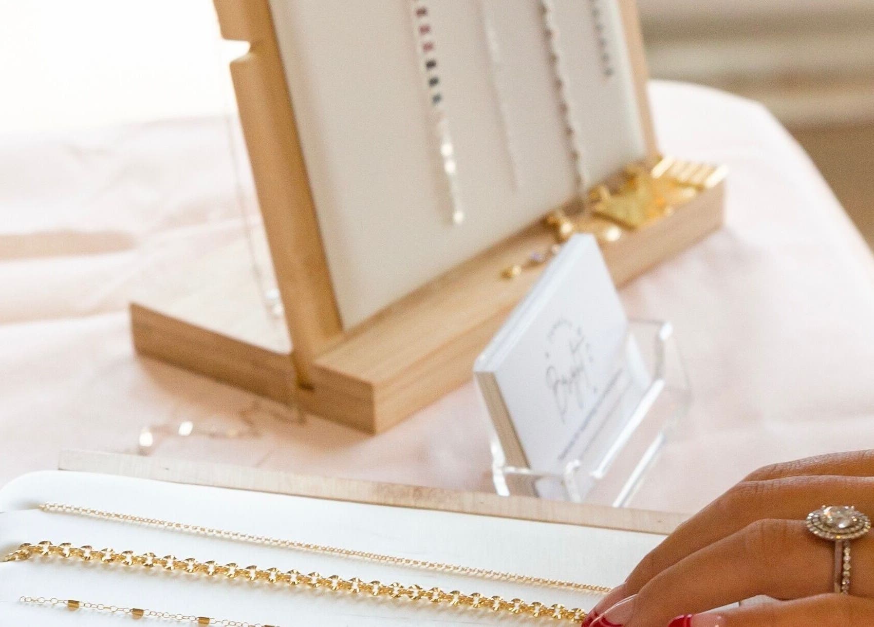 Gold jewelry display at LINKED Permanent Jewelry (Mobile Home Appointments UAE), Dubai, UAE.