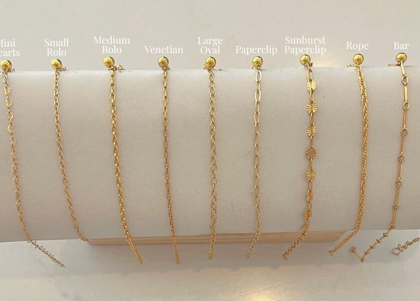 Selection of gold chains at LINKED Permanent Jewelry (Mobile Home Appointments UAE), Dubai, AE.