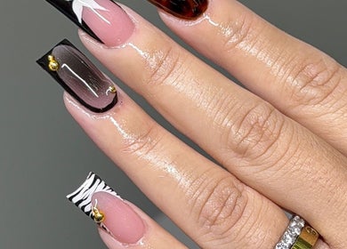 Elegant nail art at Amhnailz, Las Vegas, Nevada, US, showcasing diverse designs and exquisite detailing.