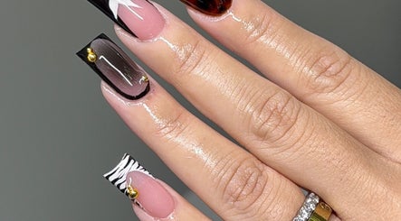 Elegant nail art at Amhnailz, Las Vegas, Nevada, US, showcasing diverse designs and exquisite detailing.