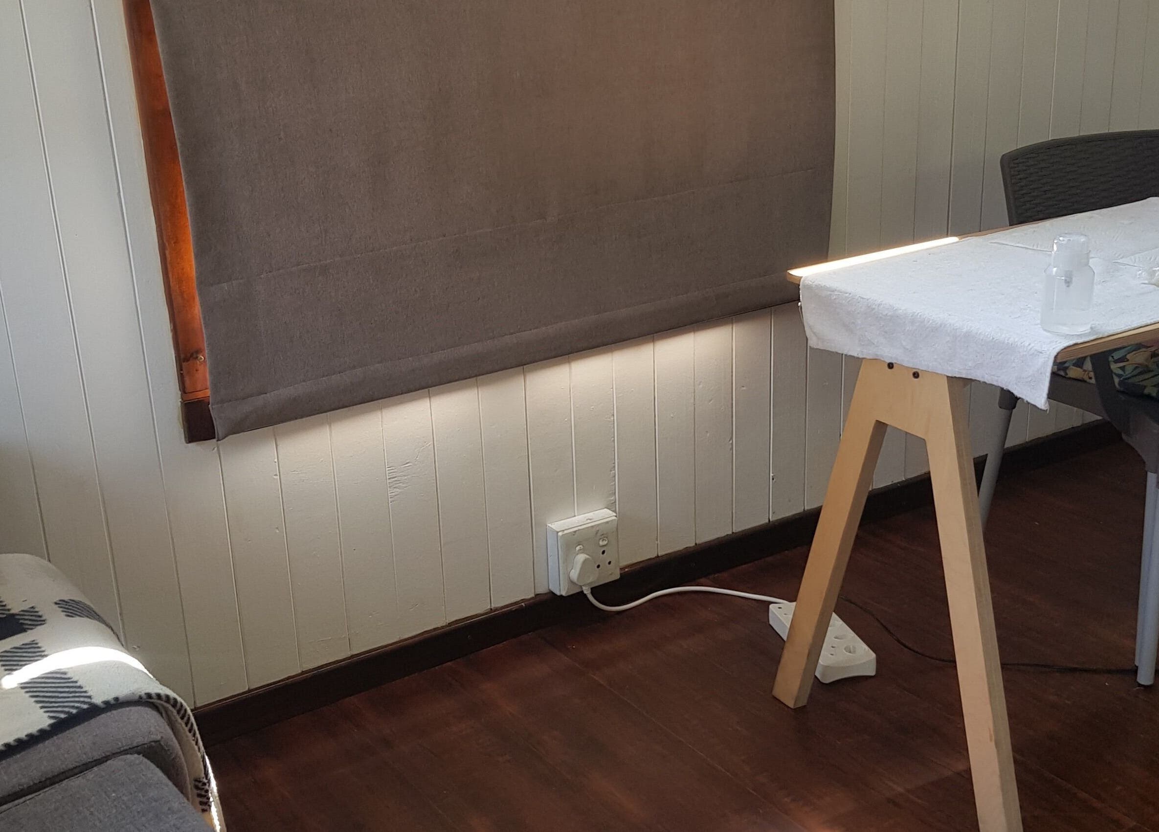 Cozy nail station at Khanyi's graCefulTouch in Sandton, Gauteng, ZA with a warm and inviting ambiance.