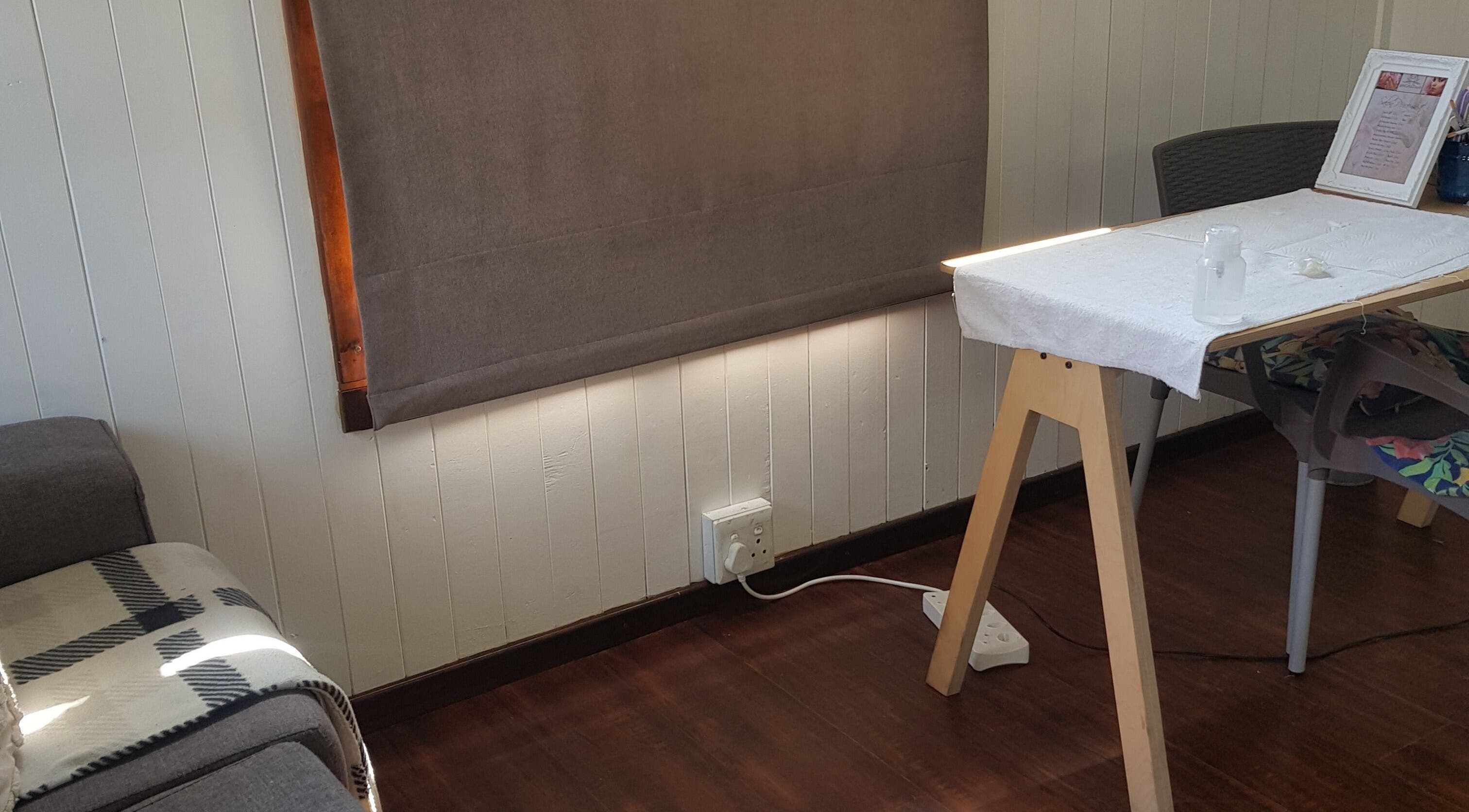 Cozy nail station at Khanyi's graCefulTouch in Sandton, Gauteng, ZA with a warm and inviting ambiance.