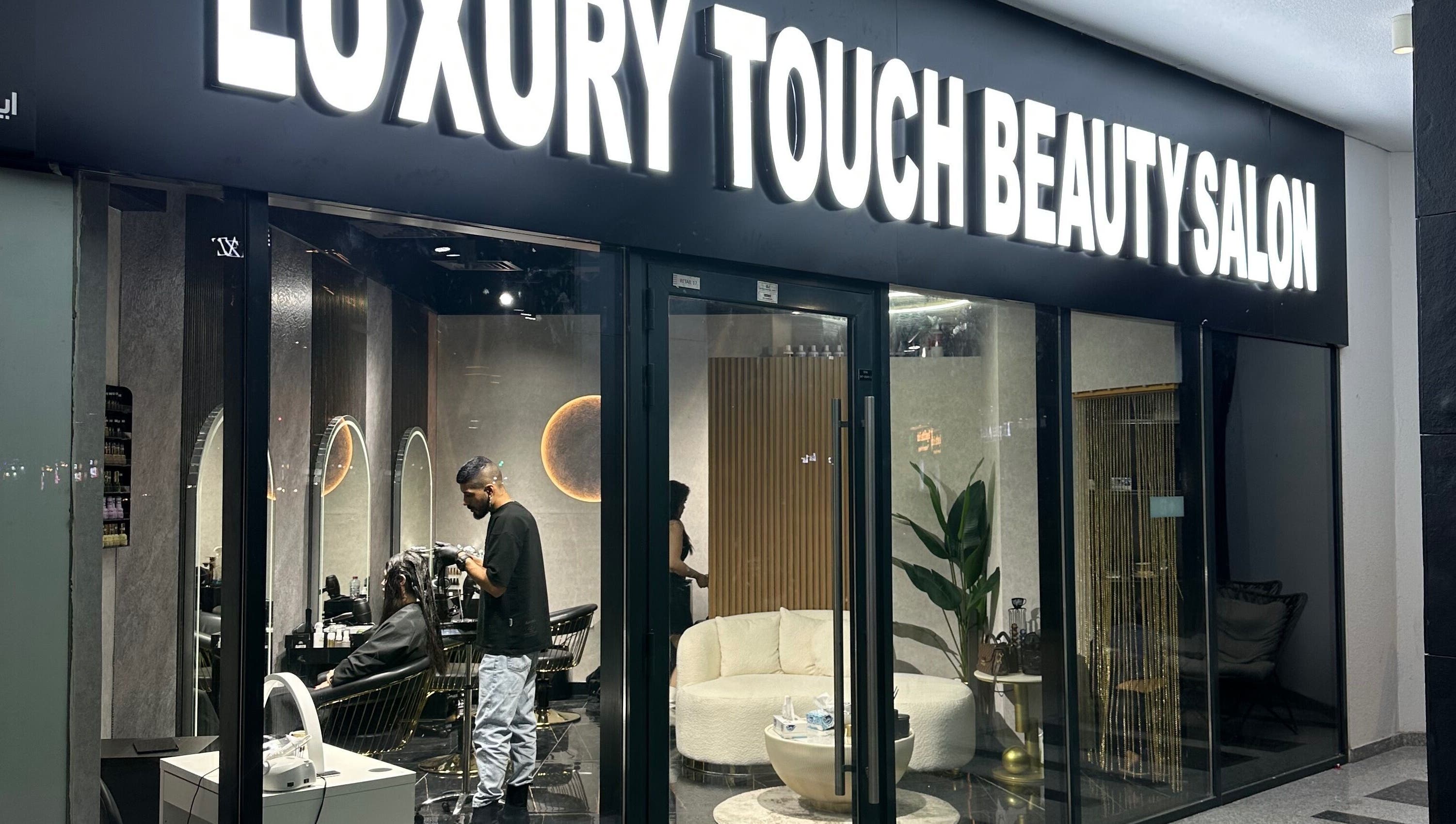 Elegant entrance of Luxury Touch Beauty Salon in Dubai, Dubai, AE with sophisticated interior visible.