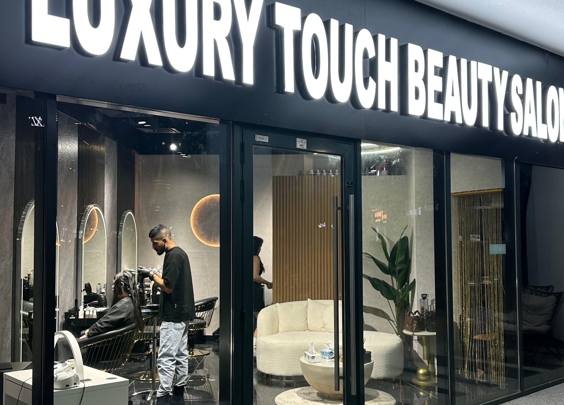 Elegant entrance of Luxury Touch Beauty Salon in Dubai, Dubai, AE with sophisticated interior visible.