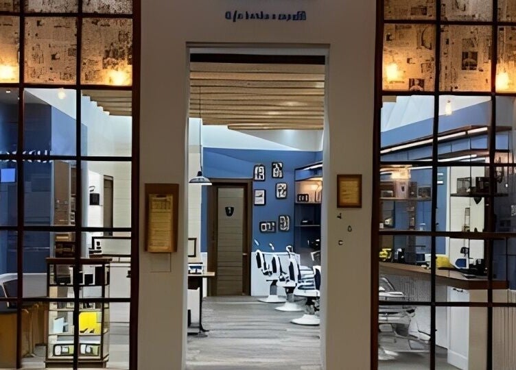 Interno accogliente del salone Il Barbiere Giussano a Giussano, Lombardia, IT, con decorazioni moderne.