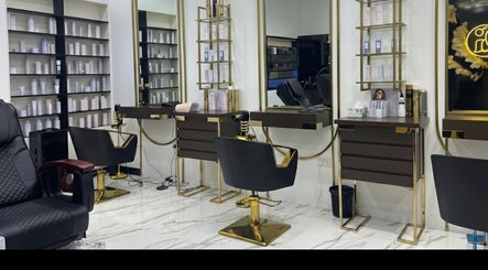 Luxurious styling stations at Glam & Go Ladies Salon L.L.C, Dubai, Dubai, AE, with gold accents and chic design.