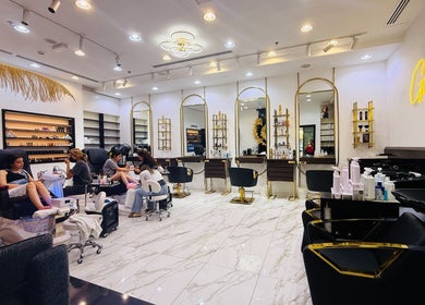 Relaxing atmosphere at Glam & Go Salon JVC, Dubai, Dubai, AE with customers enjoying beauty treatments.