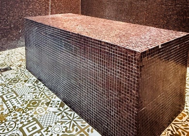 Elegant mosaic spa room at Glam & Go Salon JVC, Dubai, Dubai, AE, featuring intricate tile designs.