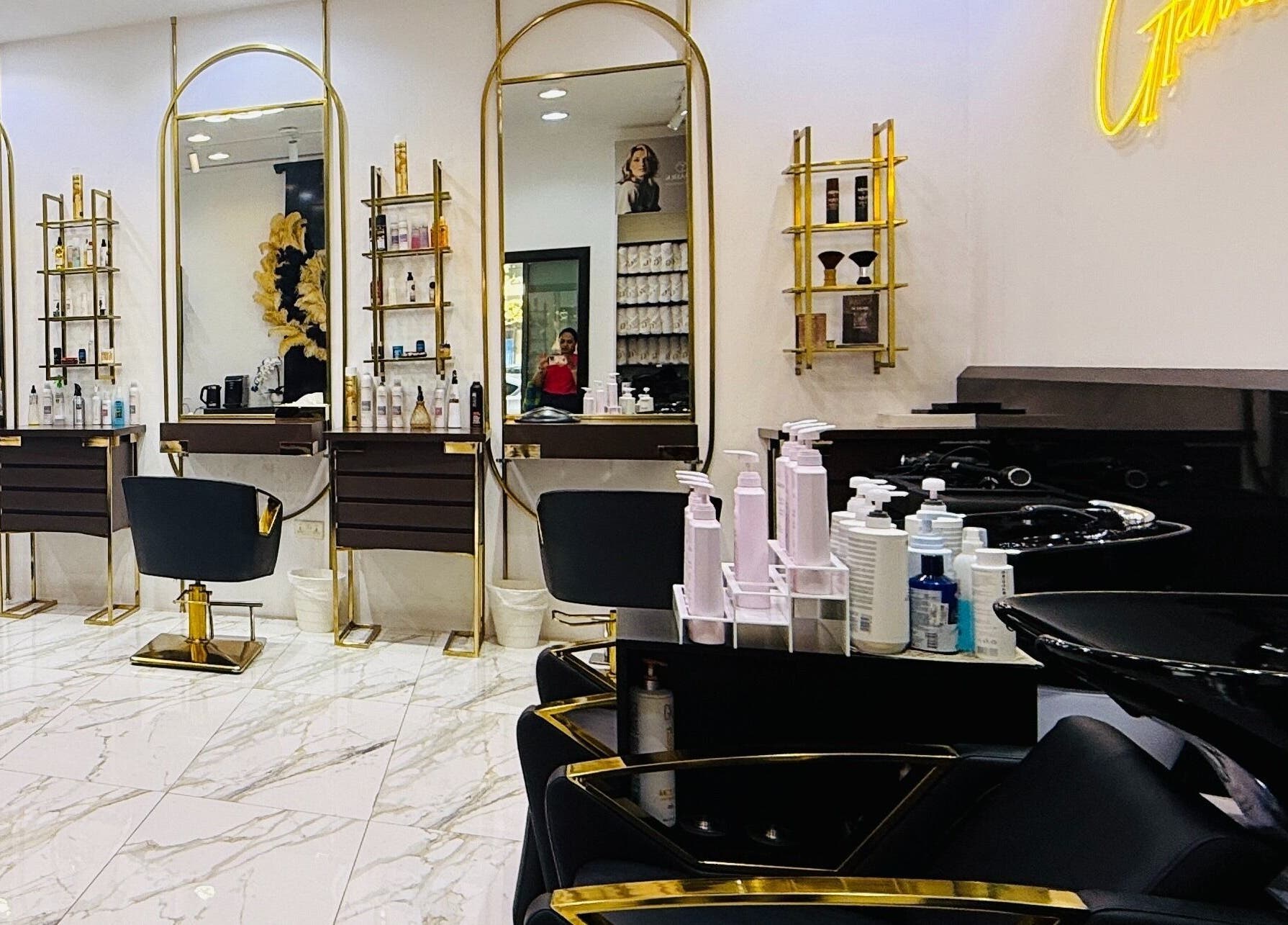 Luxurious interior of Glam & Go Salon JVC in Dubai, Dubai, AE, showcasing sleek chairs and modern design.