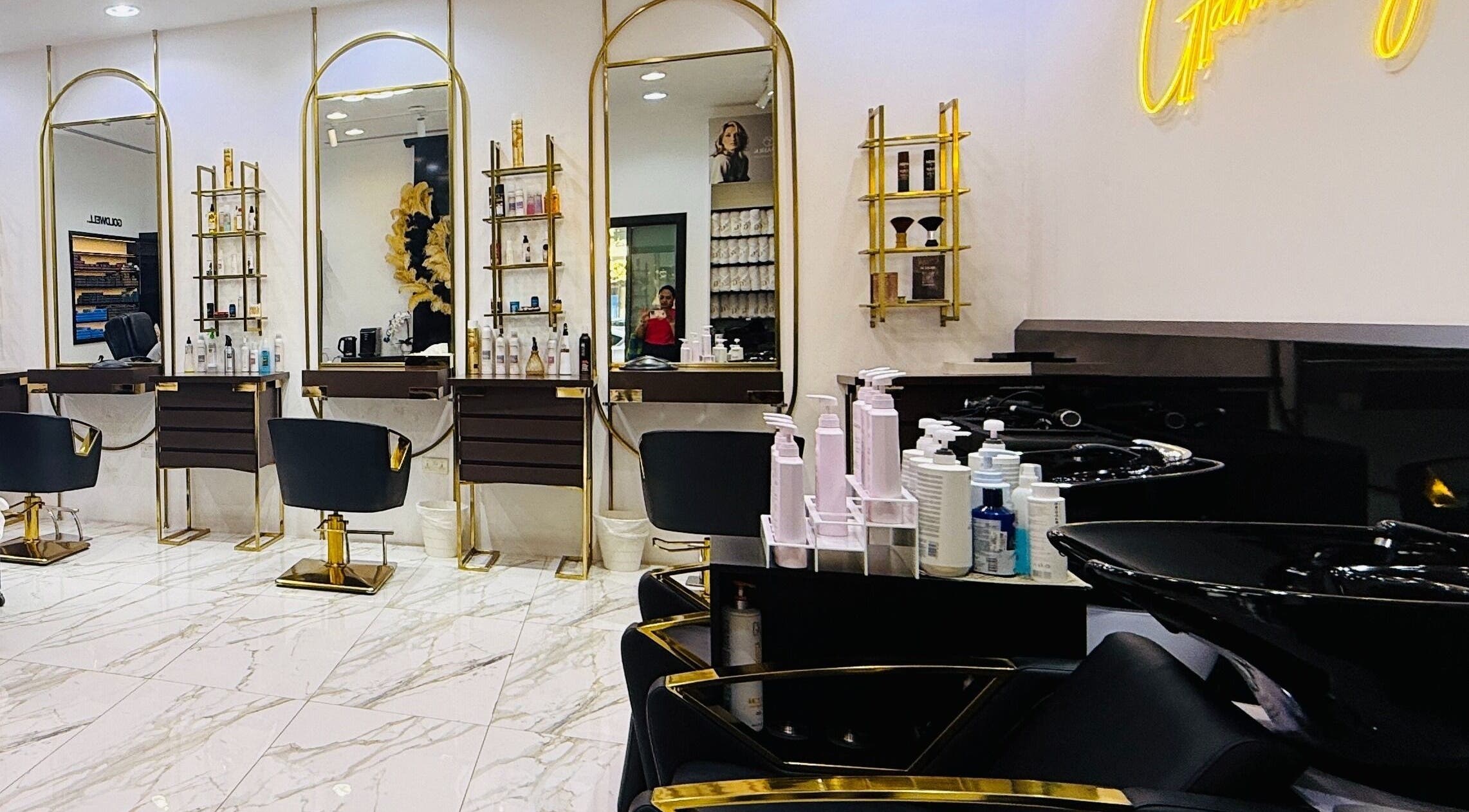 Luxurious interior of Glam & Go Salon JVC in Dubai, Dubai, AE, showcasing sleek chairs and modern design.