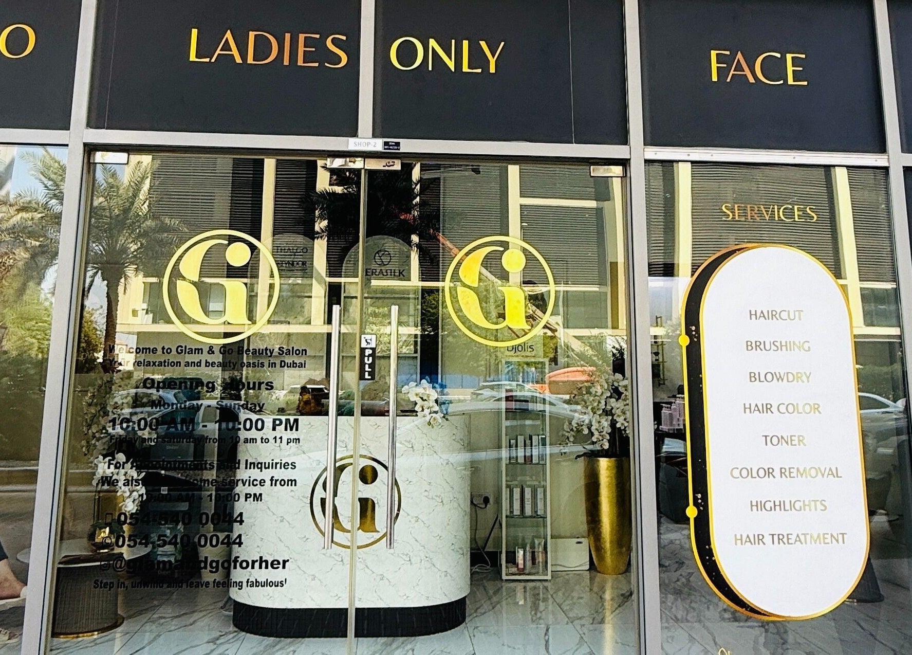 Front view of Glam & Go Salon JVC in Dubai, Dubai, AE highlighting services like haircuts and blowdry.