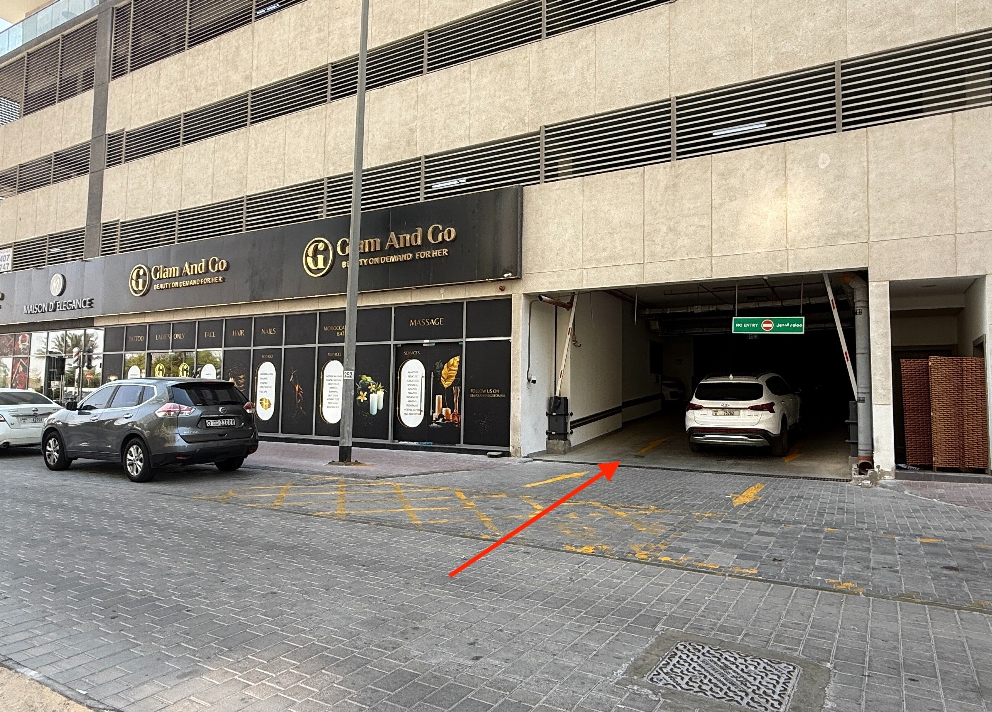 Entrance of Glam & Go Salon JVC, located in Dubai, Dubai, AE, showcasing chic exterior design.