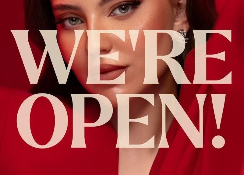 December Salon & Spa in Riyadh, Riyadh Province, SA is now open. Glamorous model in red signifies new beginnings.