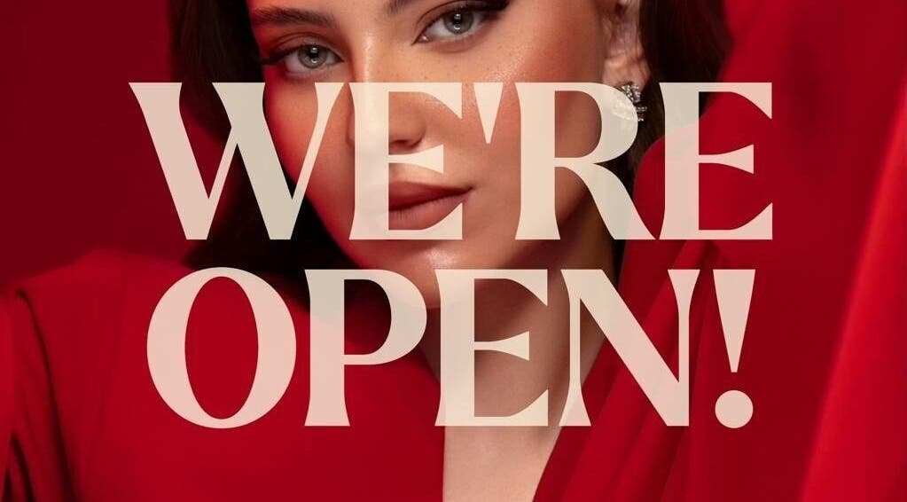 December Salon & Spa in Riyadh, Riyadh Province, SA is now open. Glamorous model in red signifies new beginnings.