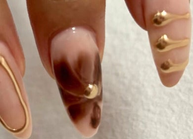 Elegant gold-accented nails at Buhle's mobile beauty & nail contour in Brakpan, Gauteng, ZA.