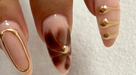 Elegant gold-accented nails at Buhle's mobile beauty & nail contour in Brakpan, Gauteng, ZA.